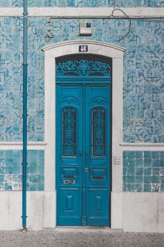 a blue door in front of a building