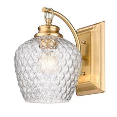 a wall light with a glass shade on it