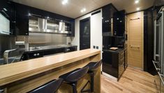 the kitchen is clean and ready to be used as a bar or dining room area