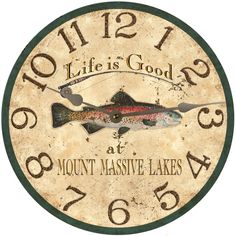 a clock with a fish on it that says life is good at mount massive lakes