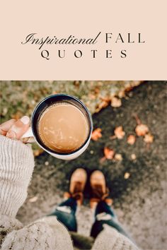 someone holding a cup of coffee with the words inspirational fall quotes