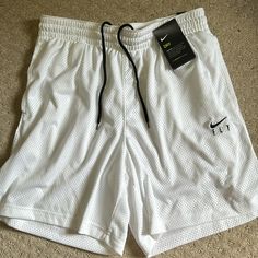 White Nike Shorts New With Tags With A Little Stain On The Waist Nike Athleisure Pants For Summer, Nike Summer Athleisure Pants, Nike Sporty Summer Pants, Summer Sports Short Pants, White Athleisure Bottoms For Summer, White Relaxed Fit Athletic Shorts For Spring, Nike White Pants For Spring, White Sports Bottoms For Summer, White Summer Sports Bottoms