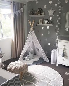 an instagramted photo of a child's room with a teepee tent