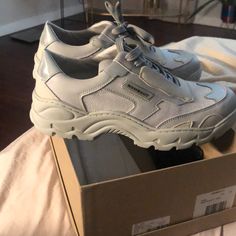 Reposhing This Item I Purchased From @Annasalas210. Loved It, But Ready To Rotate For Something New. Questions? Leave A Comment Below! Opening Ceremony, Leave A Comment, Womens Shoes Sneakers, Something New, Shoes Sneakers, Women Shoes, Sneakers, Grey, Silver