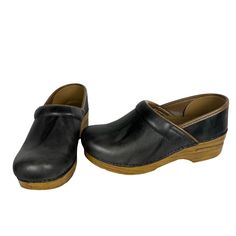 Dansko Professional Clogs Womens Eu 37 Us 6.5 7 Black Leeather Brown Wood Grain Excellent Pre-Owned Condition. Fast Shipping! Check Pictures For Measurements When Necessary. Only Pre-Owned Clothing Items Have Been Steamed And/Or Washed And Can Vary Per Item. New With Tags Items Have Not Been Washed But May Have Been Steamed. I'm Happy To Answer Any Questions You May Have! Thank You For Looking, And For Supporting Small Business! Dansko Shoes, Womens Clogs, Dansko Professional Clog, I'm Happy, Brown Wood, Mule Clogs, Mules Shoes, Wood Grain, Clothing Items