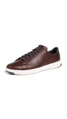 PRICES MAY VARY. Sport oxford with leather or textile uppers Textile covered foot bed for comfort and breath ability Lightweight Injection molded EVA outsole Rubber pods in heel and forefoot for traction Tennis Sneakers, Tennis Fashion, Cole Haan Men, Racquet Sports, Tennis Racquet, Red Dark, Everyday Outfit, Injection Moulding, Fashion Sneakers