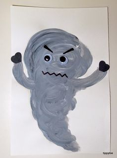 a drawing of a gray monster with two eyes and one arm raised in the air