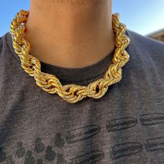 Get ready to make a statement with this Mens 14k Gold Plated Chain Hollow Rope Big Dookie! 🔥💪 Perfect for any hip hop enthusiast, this stunning chain is 20MM x 20" and screams style and confidence. 😎💰 Grab it now and elevate your fashion game. #RopeNecklace #HipHopJewelry #HipHopChain #MensNecklace #BlingCartel #GoldChain #RopeChain Gold Plated Cuban Link Rope Chain Necklace, Rope Chain Necklace Gift, Gold Rope Chain Necklace, Round Shape, Gold Necklaces With Rope Chain And Link Shape, Yellow Gold Necklaces With Cuban Link Rope Chain, Yellow Gold Necklace With Cuban Link Rope Chain, Gold Rope Chain Necklace, Solid Necklace, Hip Hop Chains