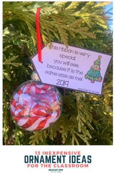 an ornament hanging from a christmas tree with candy in it and the message