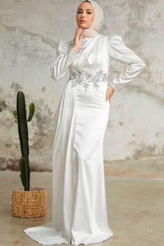 a woman wearing a satin gown Elegant Abayas, Modest Evening Gowns, Long Sleeve Evening Gowns, Casual Day Dresses, Evening Gowns Elegant, Most Beautiful Dresses, Satin Gown, Beautiful Gowns, Seasonal Fashion