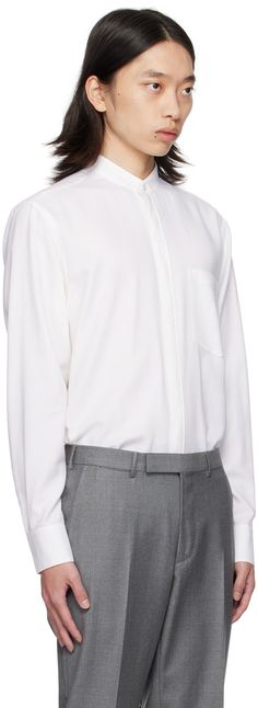 Cotton- and cashmere-blend twill shirt. · Band collar · Concealed button closure · Patch pocket · Droptail hem · Single-button barrel cuffs · Mother-of-pearl hardware Supplier color: White solid Formal Shirt With Pockets And Lapel Collar, Formal Tops With Welt Pockets And Relaxed Fit, Formal Shirt With Spread Collar And Pockets, Tailored Formal Top With Pockets, Formal Tailored Top With Pockets, Formal Shirt With Pockets And Relaxed Fit, Elegant Business Tops With Pockets, Formal Shirt With Pockets And Fold Down Collar, Classic Formal Tops With Pockets