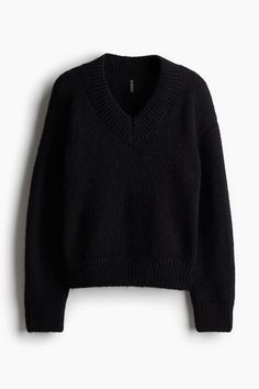 Loose-fit sweater in a soft knit. V-neck  dropped shoulders  and long sleeves. Ribbing at neck  cuffs  and hem. Black Sweater Png, Thrifted Sweaters, Womens Cream Sweater, Green Sweater Women, Dark Sweater, Black Cable Knit Sweater, Womens Grey Sweater, Grunge Accessories, Shopping Wishlist