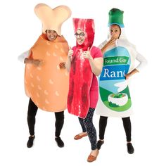 three people in costumes standing next to each other