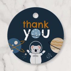 a thank you ornament with an astronaut bear and planets