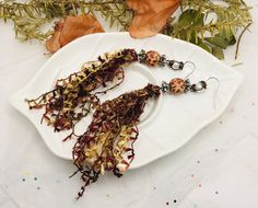 Pearl Glass Beaded Unique Brown Threaded Fringe Earrings with Leopard wooded bead design by CnJCreationsbyHand on Etsy Paper Confetti, Ribbon Yarn, Baby Shampoo, Galway, Fringe Earrings, Bead Caps, Bead Designs, Wooden Beads