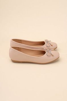 A charming and versatile addition to your shoe collection. These ballet flats feature a sweet bow detail that adds a touch of femininity to your look. The classic design and comfortable fit make them perfect for everyday wear or dressing up for special occasions. Toe: Closed, round toeHeel shape: FlatMaterial: SyntheticImported. Made in China Style:  Casual  Silhouette:  Flats  Embellishment:  Bow  Length:  NA  Closure:  NA  Heel Height:  0..5"  Width:  Regular    Made In : China Material Composition : Synthetic Care Instructions : Use a soft cloth and a little lukewarm water to clean the footwear after use. If necessary, add a small amount of mild soap.Carefully wipe off soap residue with a damp cloth. Feminine Summer Party Ballet Flats, Spring Party Pointed Toe Flats With Bow, Feminine Ballet Flats With Bow, Party Ballet Flats With Bow, Feminine Bow Flats For Spring, Spring Bow Ballet Flats Slip-on, Round Toe Ballet Flats With Bow For Party, Spring Slip-on Ballet Flats With Bow, Round Toe Ballet Flats With Bow