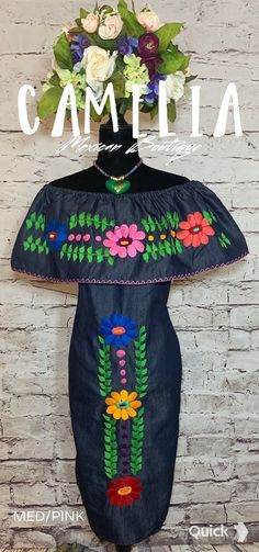 Off the shoulder Mexican denim dress. Hand embroidered with fine thread on soft denim 100% cotton fabric. Pair it up with one of our hand painted ceramic charm necklaces. Colors are based on ruffle trim. td {border: 1px solid #ccc;}br {mso-data-placement:same-cell;} OFF SHOULDER DENIM DRESS WIDTH BUST LENGTH SM 20-21" 40-42" 34-37" MED 22-23" 44-46" 38-39" LG 23-24" 47-48" 39-40" XL 27-28" 54-56" 39-40" 2XL MEASUREMENTS PER DRESS COLOR WIDTH BUST LENGTH BROWN 1 31.5" 63" 41" BROWN 2 29.5" 59" 38 Embroidered Blue Denim Dress For Summer, Mexican Denim Dress, Summer Embroidered Denim Top, Bohemian Denim Dress With Floral Embroidery, Summer Embroidered Blue Denim Top, Fitted Embroidered Denim Dress, Embroidered Fitted Denim Dress, Blue Bohemian Embroidered Denim Dress, Blue Embroidered Bohemian Denim Dress