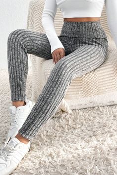 Experience the ultimate comfort and style in our Black Wide Waistband Ribbed Textured Knit Leggings! Designed with a high waist for a flattering, skinny fit, they're easy to slip on and provide a comfortable, elastic fit. The ribbed knit fabric adds texture and fashion-forward appeal, making them a favorite among all ages. Take your wardrobe to the next level with these must-have leggings! Shop now! Material: 95% Polyester, 5% Elastane