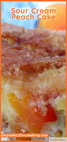 a close up of a piece of cake on a plate with the words sour cream peach cake