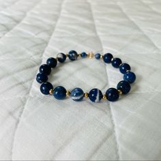 14k Gold. 7" Length. 7mm Blue Lapis Beads. 2mm 14k Gold Beads. Perfect Condition. Happy To Answer Any Questions! Blue Beaded Bracelets, Gold And Blue, Blue Lapis, Jewelry Inspo, Gold Beads, Womens Jewelry Bracelets, Blue Gold, Beaded Bracelet, Color Blue