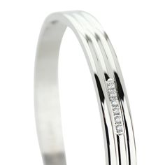 The LANE BANGLE which is made of rhodium plated stainless steel with six tiny cubic zirconia. Gold Bangles, Rhodium Plated, Cubic Zirconia, Rings For Men, Gold Plate, Bangles, Plating, Stainless Steel, Silver