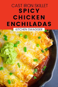 the cast iron skillet has chicken enchiladas in it