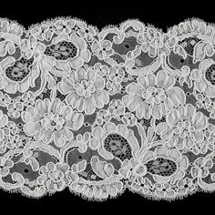 an image of white lace on black background