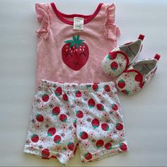 Nwot/ Like New- 6-9 Mo. Strawberry 3-Piece Outfit/Shoes. Your Little Cutie Pie Will Be So “Sweet” This Summer In This Adorable Matching Three-Piece Set. Includes Berry Bodysuit, Printed Shorts, And Matching Print Slip-On Shoes! Bundle For Discount! Lots Of Summer Outfits, Including Several Fruit-Themed. Casual Strawberry Print Sets For Spring, Cute Strawberry Print Sets For Spring, Strawberry Baby Outfit, Strawberry Shortcake Dress For Baby, Sweet Pink T-shirt With Strawberry Print, Sweet Pink Strawberry Print T-shirt, Strawberry Shortcake Baby Clothes, Carters Girl, Anime Dragon Ball Super