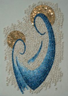 a blue and gold mosaic on the side of a white wall with words written in it