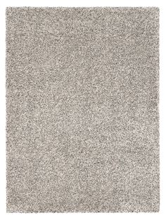 an area rug with small speckles on the top and bottom in grey tones