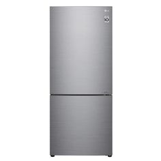 a silver refrigerator freezer sitting on top of a white wall