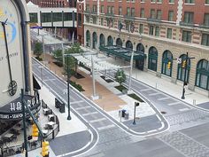 an aerial view of a city street with buildings