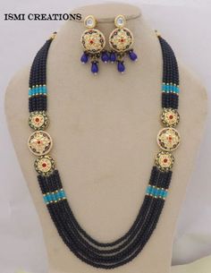 Designer Long Kundan Necklace Earrings Jewelry Set With Adjustable Cord/Dori Free Shipping Specifications Raw material - artificial jewelry, Kundan Jewelry Necklace Length = 28 CM Necklace Weight = 97 gram Earrings Weight = 13 gram Earrings Length = 6.5 CM 100% Satisfaction Guarantee: 1 Year Warranty, Long Lasting Plating, High-Quality Stones. Occasion: Perfect choice for any Indian occasion. Care: It is advisable that you keep Ismycreations products away from direct heat, humidity, and moisture Festival Blue Beaded Necklaces With Colorful Beads, Turquoise Jewelry With Black Beads For Gift, Elegant Blue Beaded Necklaces With Black Beads, Handmade Blue Jewelry Sets With Round Beads, Blue Beads For Jewelry Making And Festivals, Traditional Blue Beaded Jewelry, Round Colorful Beads Jewelry For Celebration, Colorful Round Beads Jewelry For Celebration, Blue Polished Beaded Necklaces For Festive Occasions