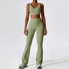 Unleash your sporty chic vibes with this set. The V-front sports bra comes with removable cups for an adjustable fit, while the flare legging with scrunch butt detail flatters your figure. This fit is perfect for any workout or just lounging with a mimosa in hand. Product Details: Nylon/Spandex V-front Sports Bra w/ removable padding High Waist Flare Legging Scrunch Butt Design Satin Soft Fabric Quick Drying Breathable Imported Work Out Sets Outfit, Elegant Sportswear, Lululemon Set, Sport Suit Women, Bra Tank Top, Inner Warrior, Yoga Suit, Bra Tank, Workout Sets