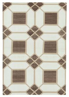 a brown and white area rug with squares on the bottom, in different sizes and colors