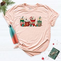 Christmas Coffee Shirt, Coffee Lover Shirt, Coffee Christmas Shirt, Christmas Latte Shirt, Winter Shirt, Women's Christmas Shirt, Xmas Shirt. Hi! Welcome to our store. It's good to see you here. Our aim is to offer you first-class clothing in your most beautiful moments with our graphic t-shirts that we designed or designed with your ideas. I am sure you will like our designs for your family, friends and you. IMPORTANT MATTERS FOR ORDERING: 1-) Please check and review all photos. 2-) Our sizes a Christmas Latte, Coffee Christmas, Class Outfit, Grace And Lace, Womens Christmas Shirts, Coffee Shirt, Winter Shirts, Xmas Shirts, Coffee Shirts