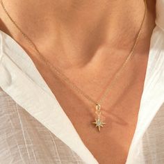 Elevate your style with our Diamond North Star Necklace. A unique and celestial 14k Solid yellow Gold Polaris Star Pendant for women, a dainty compass necklace. Features * Made to Order. * Gold KT: 14KT * Custom Gold Color: Yellow Gold * Charm 13.50mm x 13.50mm * Charm Thickness: 1.95mm * Diamond Color-Clarity: D-E-F color VVS clarity (excellent ideal cut) * Total Ctw: 0.06 ctw * Ready to Ship in 5-7 Business Days ✓ We care about the environment,the jewelry we cast is made with recycled gold. We source exclusively post-consumer material that is refined back to their pure elements to ensure that the gold is in the same quality. Our designs are made from 14k/18k/10k real solid gold ✓ We care about customer satisfaction and long-term relationship so our designs are made by considering daily u Celestial Star Jewelry, Dainty Necklace Diamond, Polaris Star, Gold Star Pendant, Celestial Pendant, North Star Necklace, Compass Necklace, Gold Diamond Necklace, Diamond Pendant Necklace