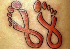 an image of a tattoo on the back of a woman's shoulder and foot