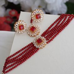 Maroon choker set includes a necklace, earrings and mang tikka. Festive Choker Sets For Festivals, Temple Jewelry Choker Set For Diwali, Diwali Temple Jewelry Choker Set, Maroon Jewellery Set, Necklace Set Indian, Bridal Choker, Jhumki Earrings, Pearl Necklace Set, Long Pearl Necklaces