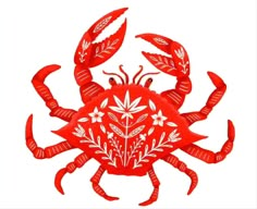 a red crab with white flowers and leaves on it