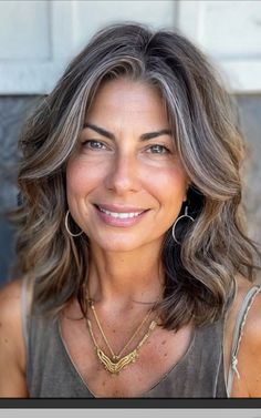 Brunette Grey Hair Transition, Natural Grey Brown Hair, Grey Blended Hair Going Gray, Gray Transition Hair Highlights Curly, Butterfly Haircut Gray Hair, Embrace The Grey Hair, Medium Length Grey Hair Styles Over 50, Grey With Blonde Highlights, Gray Blending Brown Hair