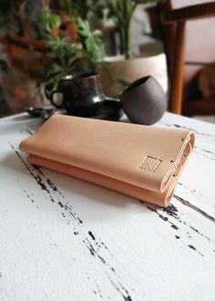 100% Handmade and Hand Stitched Personalized Leather Wallet With Genuine Quality Metal Hardware. With this wallet, you can put your phone as well as your card and money. Thanks to its unisex design, will be a perfect gift for him and for her. Unique gift option for Birthday, Christmas, Valentines Day, Fathers' Day and Mothers' Day.  100% HANDMADE HAND STITCH GENUINE LEATHER QUALITY METAL HARDWARE Meet Ki Studio Co! ...a studio producing completely hand-crafted products. ...a studio harmonizing fine craftsmanship with modern, contemporary design interpretations on its products. Meticulously doing everything from design to shipping phase, we care about your taste, satisfaction, and appreciation. Being different is very important to us. Thus, we strive to make different, innovative, contempor Leather Iphone Wallet, Personalized Leather Wallet, Vegetable Leather, Handmade Leather Wallet, Leather Card Case, Clip Wallet, Wallet Gifts, Best Gifts For Men, Metal Accessories