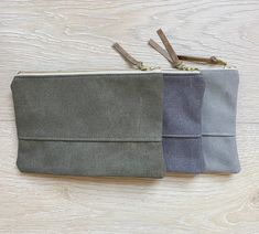 "Canvas zipper pouch in three colors This pouch is perfect to keep you organized on your adventure as well as everyday life. It is made with sturdy canvas fabric and lined with a gray and white stripe fabric. It is fully interfaced giving it extra structure. It is finished off with a brass zipper. It measures: 8.5\" wide x 6\" tall Please let me know if you have any questions!" Canvas Zipper Pouch, Green Moon, Pouch Makeup, Stripe Fabric, Small Pouches, Makeup Pouch, Coin Pouch, Canvas Pouch, Striped Fabrics