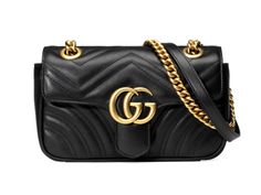 The small GG Marmont flap bag has a softly structured shape and an flap closure with Double G hardware. The sliding chain strap can be worn multiple ways, changing between a shoulder and a top handle bag. Made in matelassé chevron leather with a heart on the back. Classic Gucci Bag With Chain Strap, Chic Gucci Shoulder Bag With Cc Turnlock Closure, Chic Gucci Shoulder Bag With Cc Turnlock, Trendy Gucci Shoulder Bag With Detachable Strap, Trendy Gucci Crossbody Shoulder Bag, Trendy Gucci Crossbody Bag, Trendy Gucci Evening Bags, Mastercard Logo, Gucci Mini