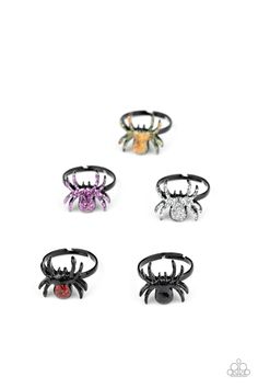 six spider rings with different colored stones on each one, all in black and white