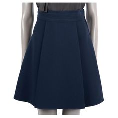 100% authentic Miu Miu flared short skirt in midnight blue triacetate (71%) and polyester (29%). The design features side pockets and two front pleats. Opens with a zipper on the side. Brand new with tags. Measurements Tag Size 38 Size XS Waist From 66cm (25.7in) Hips From 94cm (36.7in) Length 52cm (20.3in) All our listings include only the listed item unless otherwise specified in the description above. Luxury Fitted Blue Pleated Skirt, Miumiu Skirt, Navy Skirt, Short Skirt, Flare Skirt, Midnight Blue, Miu Miu, Design Features, Navy Blue