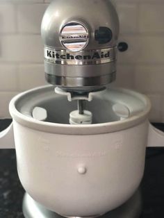 a kitchen aid mixer sitting on top of a counter