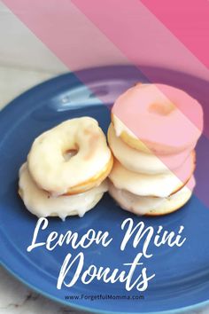 lemon mini donuts on a blue plate with pink frosting