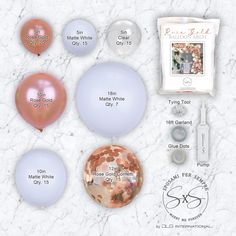 some balloons and other items on a white table with the names of each balloon in it