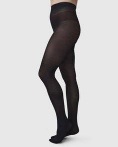 Olivia is one of Swedish Stocking's bestselling basic tights, and also the world's greatest tights according to 422 women. Read more here. Olivia is an absolute must have to begin your hosiery collection! Here are the reasons why you’ll love them as much as we do: 60 denier tights Semi-opaque Comfort waistband Flat seams Toe reinforcement Cotton gusset Knitted from recycled yarn Produced by Calze Ileana S.p.a. Made in Italy The world's greatest tights according to 422 women One of the most durab Classic Elastane Tights, Classic Micro-elastic Solid Tights, Classic Solid Micro-elastic Tights, Classic Black Tight Tights, Classic Black Tights, Sheer Tights, High Knees, Recycled Yarn, Black Tights